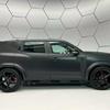 Dacia Duster RS - sidevisning av bilen