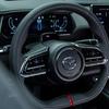 Et lite bilde av Mazda EZ-6 Sports Edition - sett fra siden