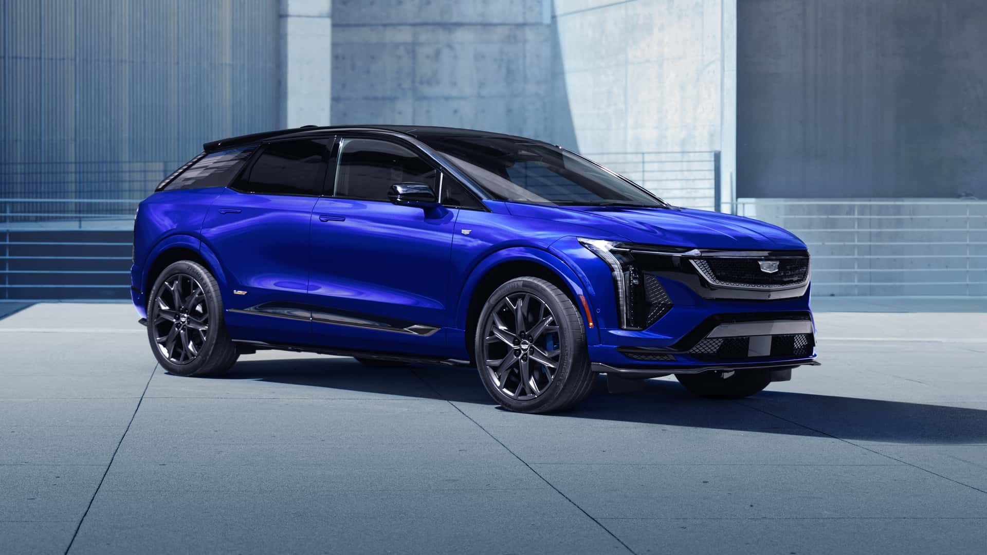 2026 Cadillac Optiq V i bevegelse. 2026 Cadillac Optiq V i bevegelse.